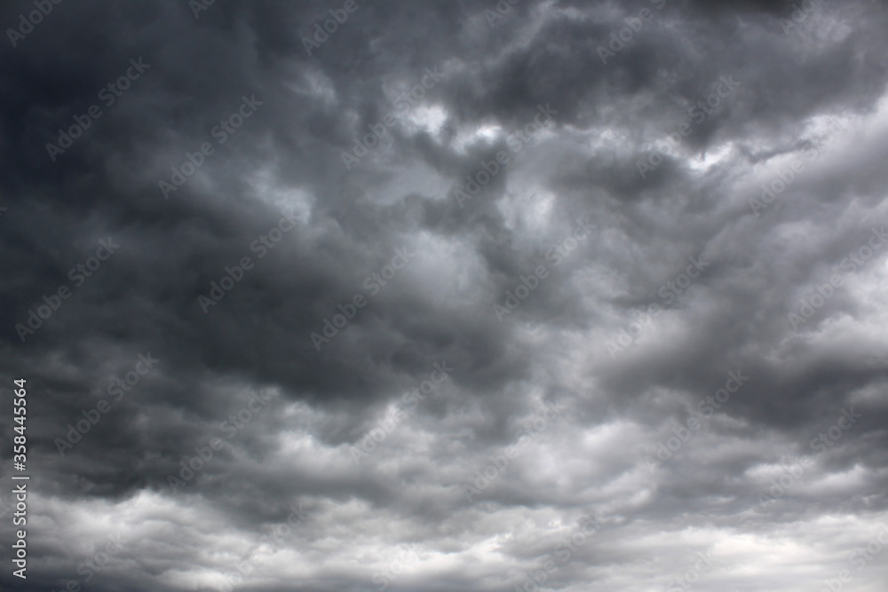 Dark clouds before the rain covered the whole sky Dark clouds before the rain covered the whole sky