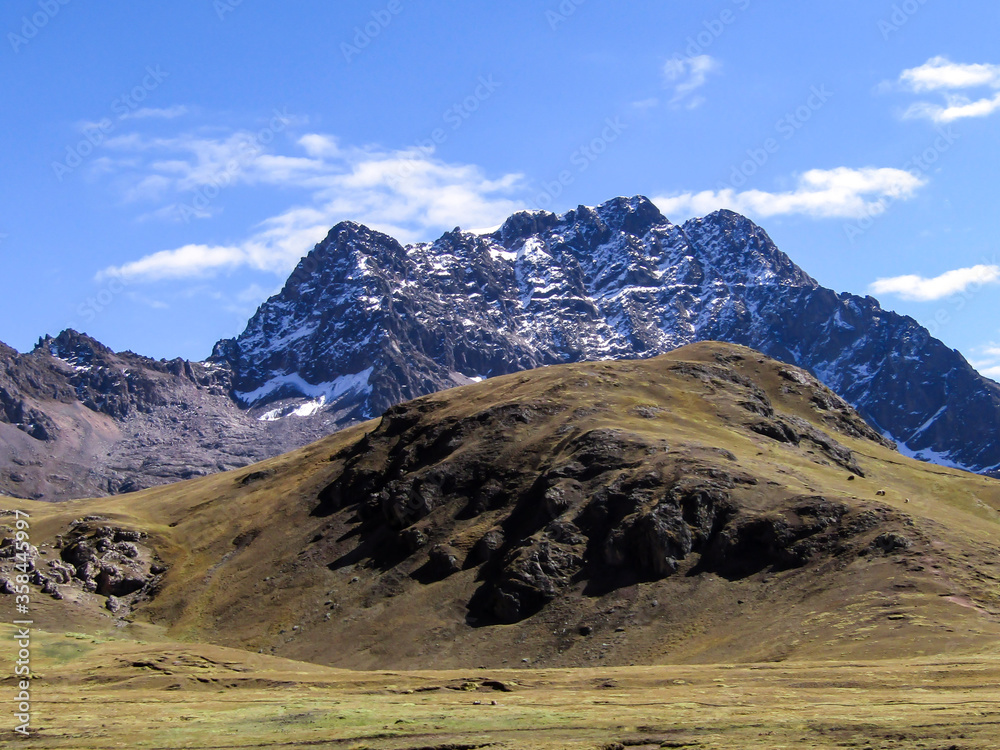 Landscape of the snowy mountains on the way to the rainbow mountain in Cusco, Peru.