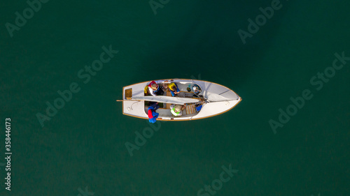 Small sailing boat in vast seascape between Bird Island and Turkey Beach, Queensland © Photopia Studio