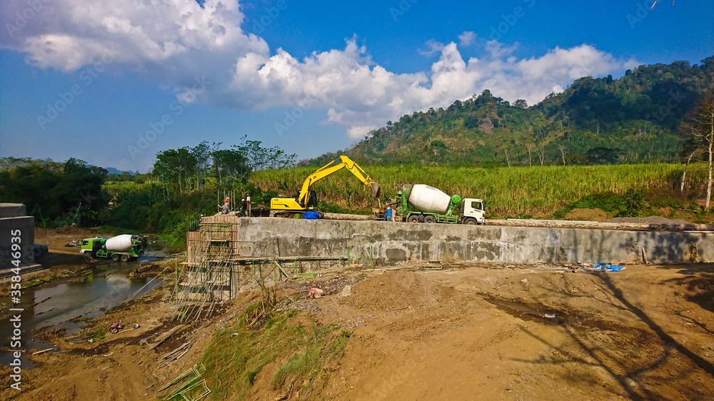 Excavator digging a trench, Work on the construction site. Stock Photo ...