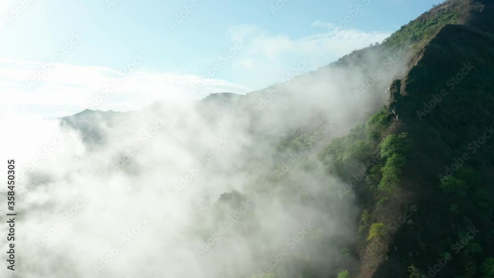 Steady drone timelapse above the clouds and the mountains of Western Ghats, India, Mulshi, Maharashtra Steady drone timelapse above the clouds and the mountains of Western Ghats, India, Mulshi, Maharashtra