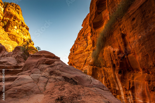 It's Beautiful red rock formations in Petra (Rose City), Jordan. Petra is one of the New Seven Wonders of the World. UNESCO World Heritage © Anton Ivanov Photo
