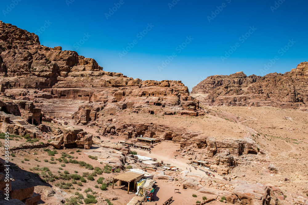 It's Rocks in Petra (Rose City), Jordan. The city of Petra was lost for over 1000 years. Now one of the Seven Wonders of the Word