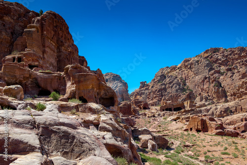 It's Rocks in Petra (Rose City), Jordan. The city of Petra was lost for over 1000 years. Now one of the Seven Wonders of the Word