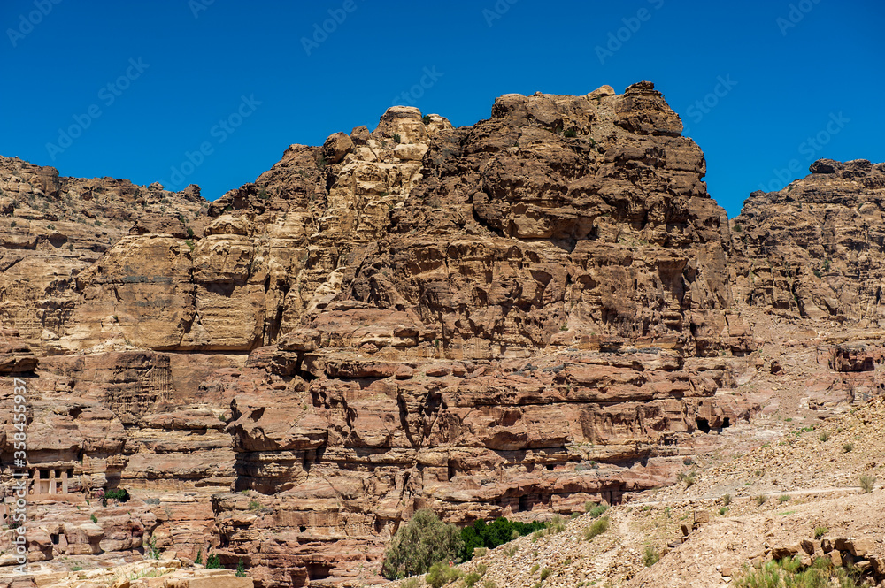 It's Rock in Petra (Rose City), Jordan. The city of Petra was lost for over 1000 years. Now one of the Seven Wonders of the Word