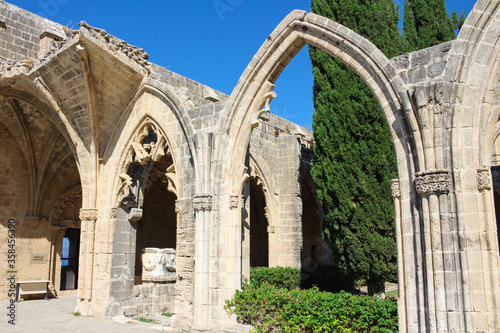 Bellapais Abbey, White Abbey, Abbey of the Beautiful world.Arches and the entrance to the refectory, a fragment of the Salamis sarcophagus, used by the monks as a washroom.
