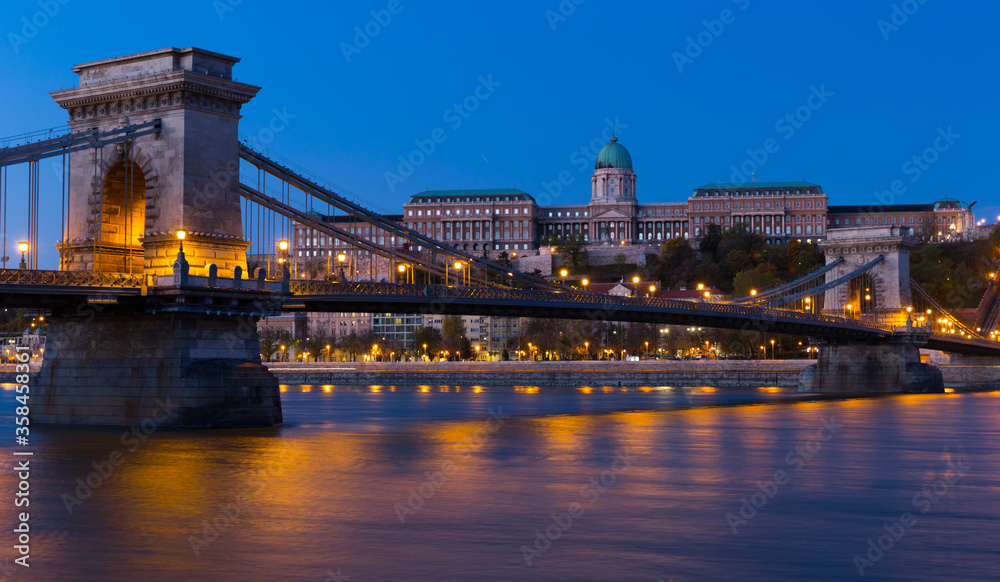 Fototapeta premium Night light of Chain Bridge near Buda Fortress is hungarian landmark