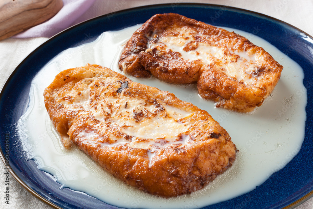 Torrijas are a close cousin to the popular bread-based pudding which is served in many countries across Europe and consist of slices of bread dipped in a mixture usually involving milk, eggs or sugar.