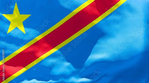 The national flag of Congo flutters in the wind photo