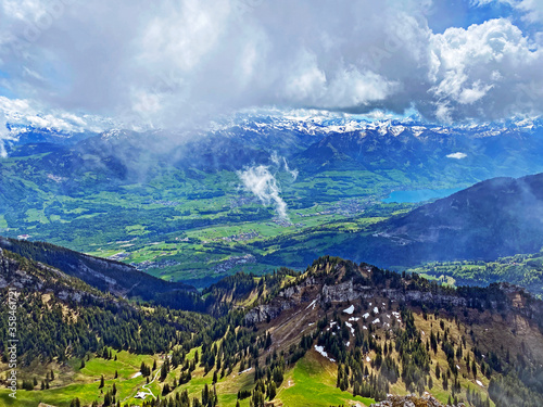 View of the fertile valley with settlemens between the Lakes Alpnachersee and Sarnersee from the Pilatus massif, Alpnach - Canton of Obwalden, Switzerland (Kanton Obwalden, Schweiz) photo
