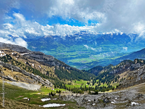 View of the fertile valley with settlemens between the Lakes Alpnachersee and Sarnersee from the Pilatus massif, Alpnach - Canton of Obwalden, Switzerland (Kanton Obwalden, Schweiz) photo