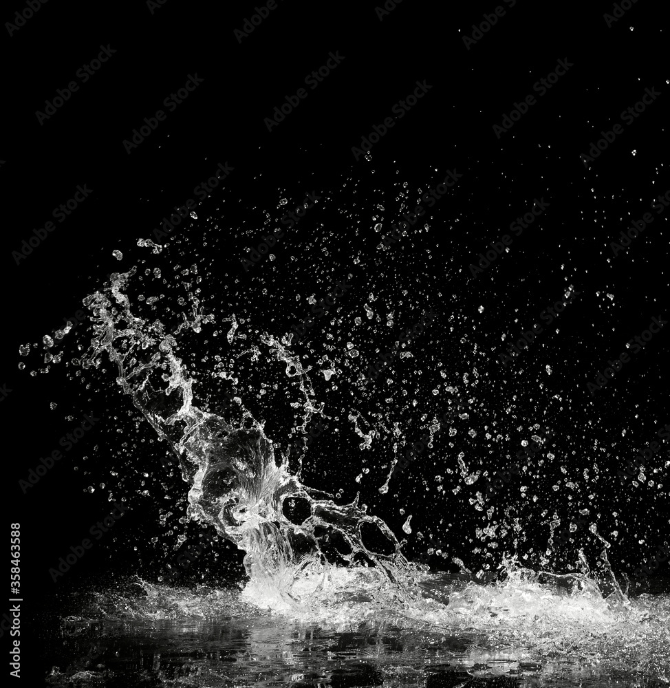 water splash on black background Stock Photo | Adobe Stock