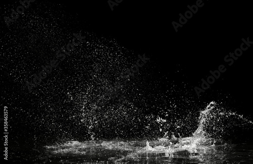 Photo water splash on black background