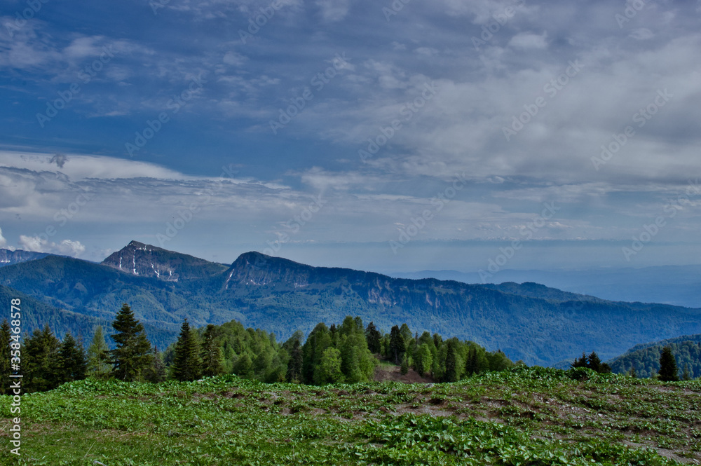 Scenery of the Greater Caucasus Mountains, Georgia. In the background is the mountains Jvari and Migaria. Scenery of the Greater Caucasus Mountains, Georgia. In the background is the mountains Jvari and Migaria.