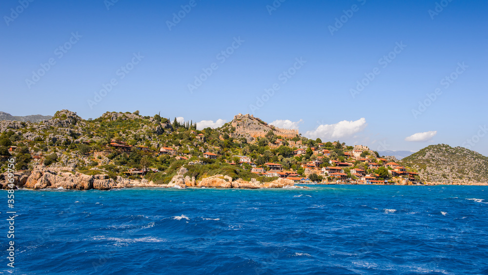 It's Kalekoy village (Simena) with the Byzantine castle in the c