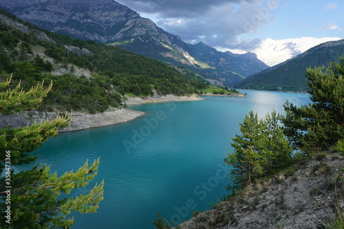 panoramic view of Serre Ponçon lake in the southern Alps, France on a stormy day