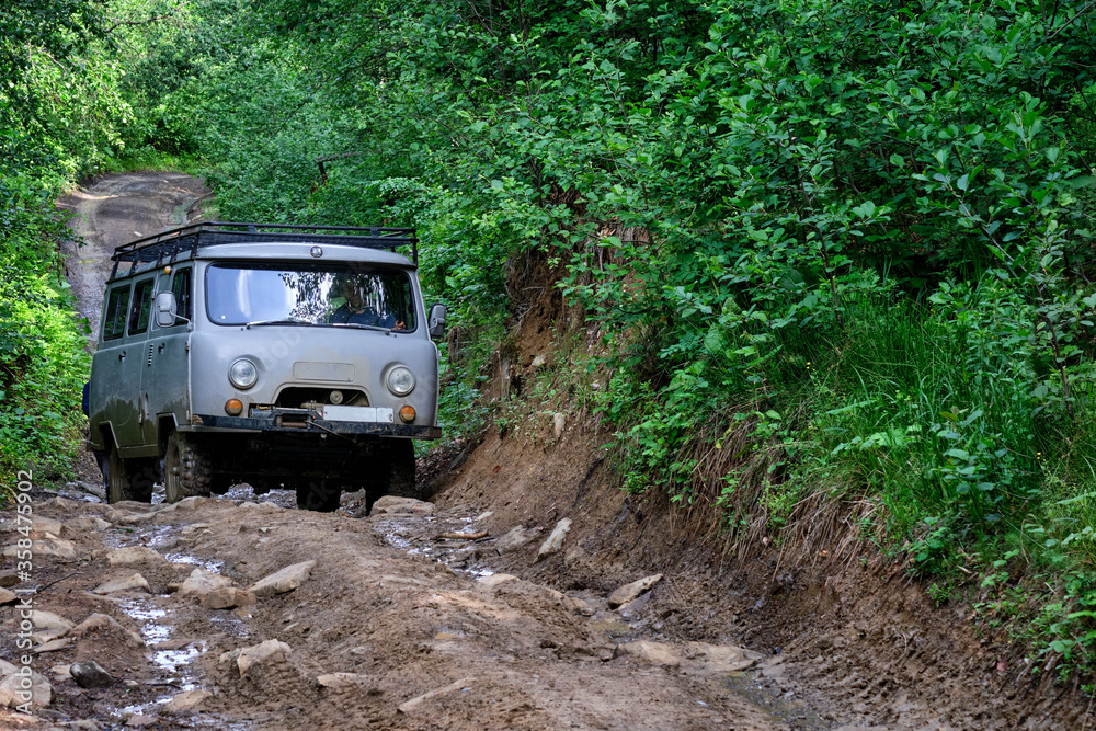 Naklejka premium all terrain vehicle for off road mountain driving