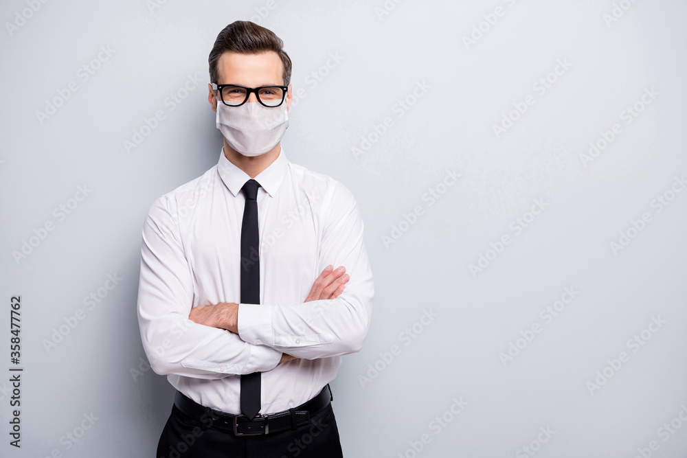 Portrait of his he nice content healthy guy employer folded arms wearing safety mask stop china wuhan viral pneumonia concept copy space isolated grey color background