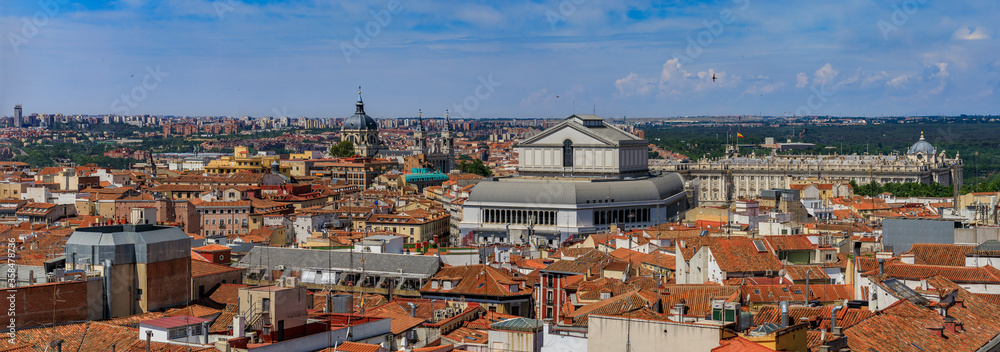Aerial view of the Madrid cityscape with Almudena Cathedral and Teatro Real rooftops in the city center in Madrid, Spain