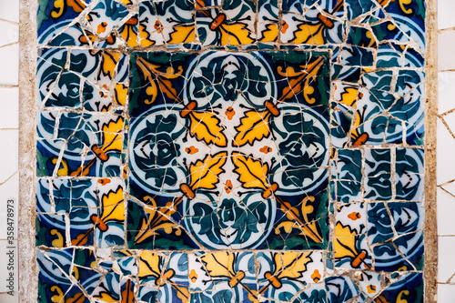 Close-up Mosaic Antonio Gaudi in the Park Guell, Barcelona photo