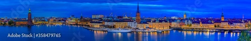 Panoramic sunset view onto Stockholm old town Gamla Stan and Riddarholmen church in Sweden