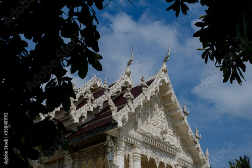 a beautiful little white Thai temple in Krabi province  by the sea