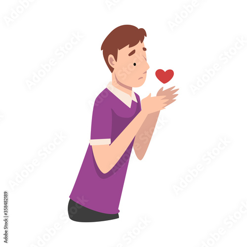 Young man holds a heart in his hands. Vector illustration.