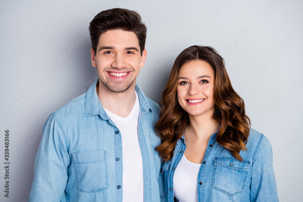Closeup photo lady guy couple in love stand cuddle hugging together romantic feelings date toothy smile wear casual denim shirts outfit isolated grey color background Closeup photo lady guy couple in love stand cuddle hugging together romantic feelings date toothy smile wear casual denim shirts outfit isolated grey color background