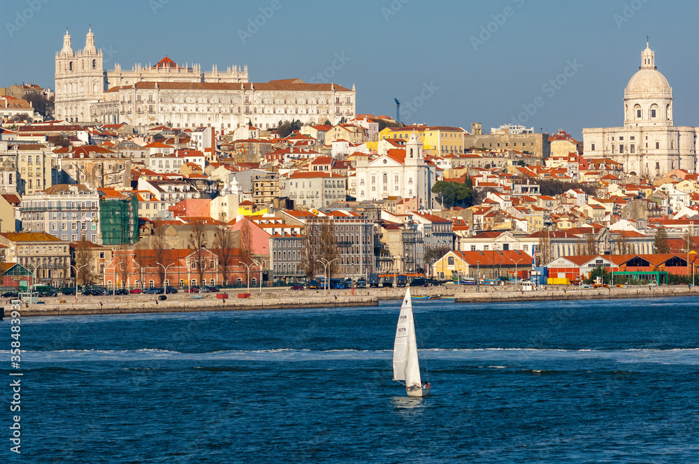 National Pantheon and Alfama from Tagus River as yacht passes