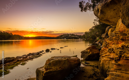 Sunset scape of Georges River and Illawong Village photo