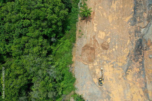Environmental damage. Deforestation and logging. Aerial photo of forest cut down causing climate change  photo