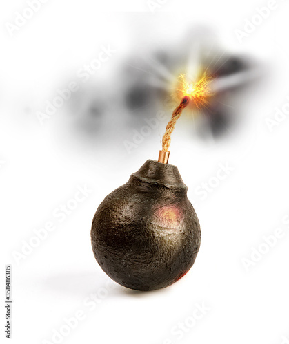 old round classic round black antique bomb with a long burning rope wick isolated on a white background