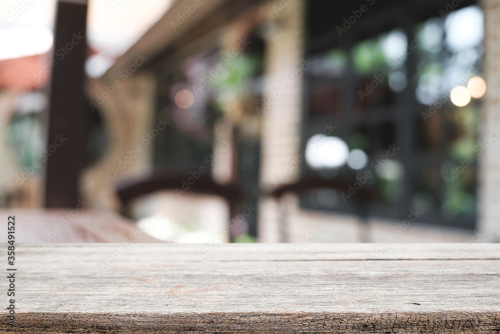 Blurred background of home garden picnic and wooden table free space for product display. Blurred background of home garden picnic and wooden table free space for product display.