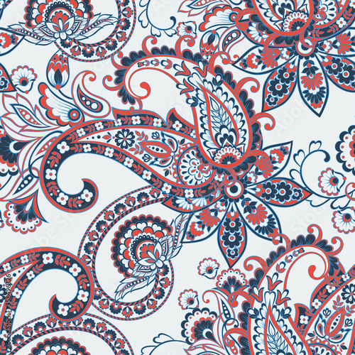 Paisley ethnic seamless pattern with floral elements.