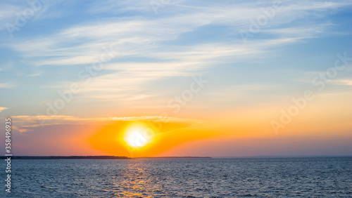 dramatic sunset over a sea bay © Yuriy Kulik