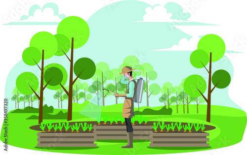 A man spraying insecticide liquid to the plants