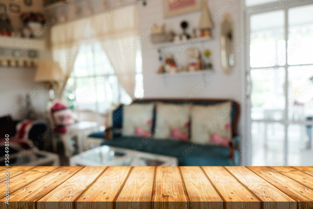 Empty wooden table space platform and blurred restaurant or coffee shop background for product display montage. Empty wooden table space platform and blurred restaurant or coffee shop background for product display montage.