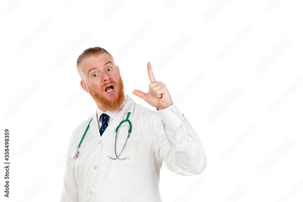 Redhead doctor with a medical gown Redhead doctor with a medical gown