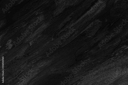 Texture and Seamless background of black granite stone