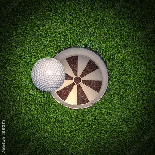 detail of a golf ball falling into the hole.