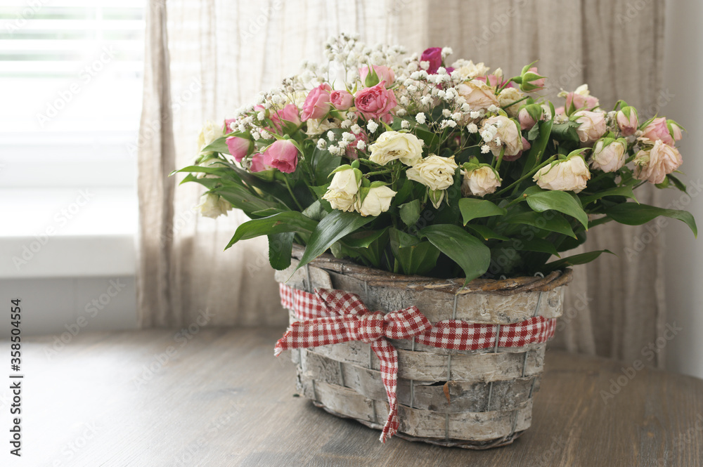 Flowers bouquet in basket Flowers bouquet in basket