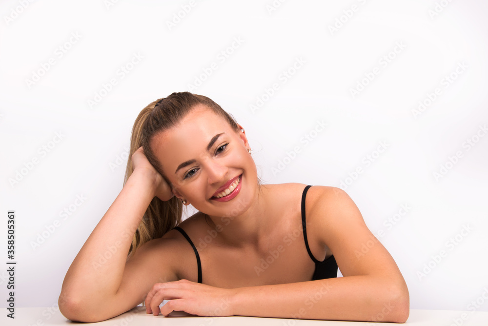 Obraz premium Beauty portrait of young woman with natural look, isolated on white. Nude make up, perfect skin, skin care concept