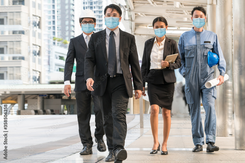 Plakat Confident business people with face mask protect from Coronavirus or COVID-19.