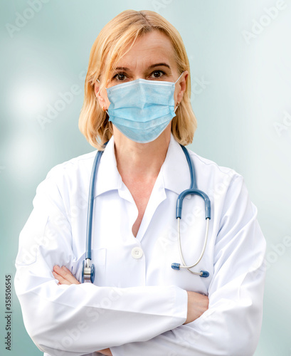 Doctor wear face mask in hospital protect from coronavirus disease or COVID-19. photo