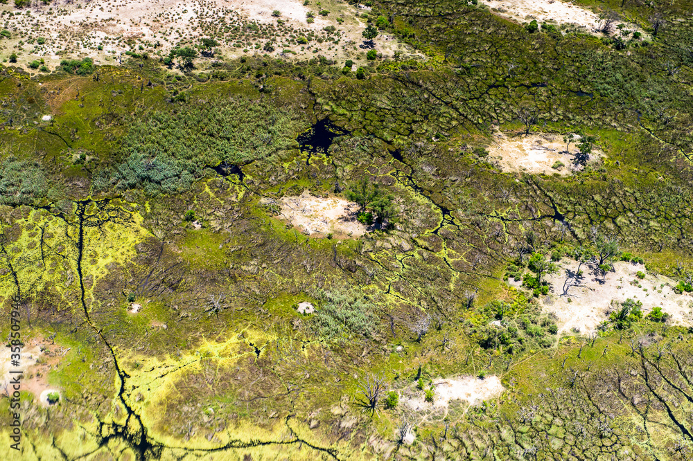 It's Beautiful aerial view of the Okavango Delta (Okavango Grassland), One of the Seven Natural Wonders of Africa, Botswana It's Beautiful aerial view of the Okavango Delta (Okavango Grassland), One of the Seven Natural Wonders of Africa, Botswana
