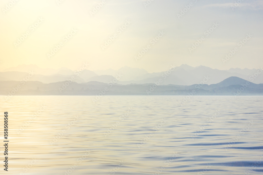 Fototapeta premium The sea at dawn. Background mrsky landscape. Calm ocean.