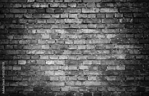 Vintage brick wall texture background with vignette