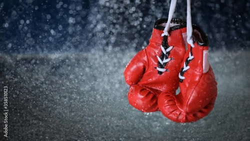 Wallpaper Mural cinemagraph of a red boxing gloves on a water drops background. Sport lifestyle. Motivation. Goal achievement. Protect yourself. Motion photography Torontodigital.ca