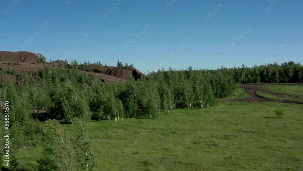 Tula oblast romantsevo hills under bright blue sky drone aerial shot. High quality 4k footage fly over tulskaya oblast romantsevskie hills, konduki shot under cloudy blue sky Tula oblast romantsevo hills under bright blue sky drone aerial shot. High quality 4k footage fly over tulskaya oblast romantsevskie hills, konduki shot under cloudy blue sky