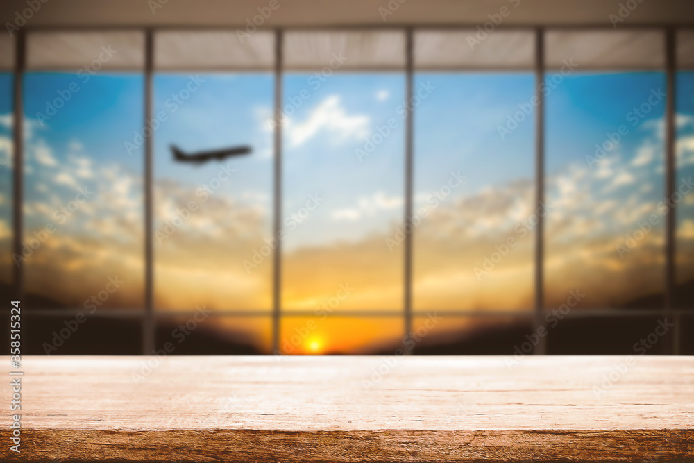 Fototapeta premium Empty wooden table space platform and Airport background for product display montage.